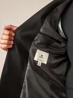 Pakken*Next Zwart - Tailored fit - Tailored Fit Wool Blend Motionflex Suit Jacket