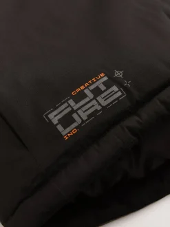 Schoolkleding|Jassen En Jacks|Next - Waterdichte gewatteerde binnenjas (3-16jr) Zwart