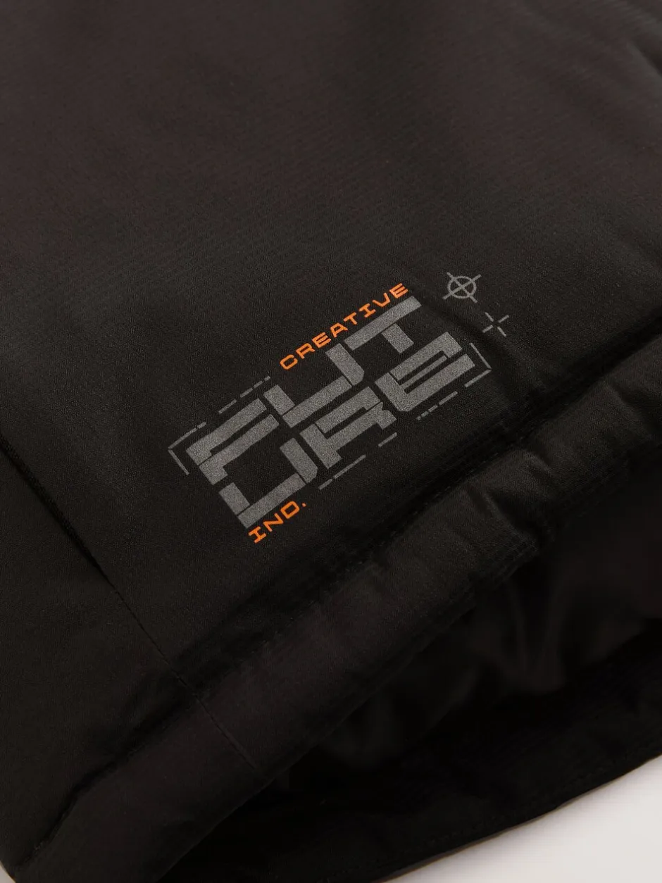 Schoolkleding|Jassen En Jacks|Next - Waterdichte gewatteerde binnenjas (3-16jr) Zwart