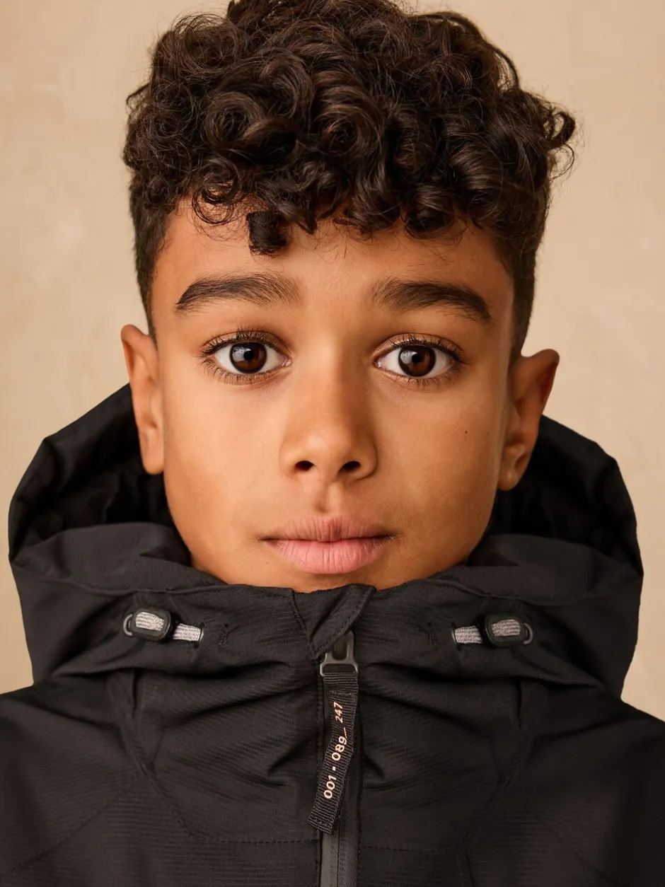 Schoolkleding|Jassen En Jacks|Next - Waterdichte gewatteerde binnenjas (3-16jr) Zwart