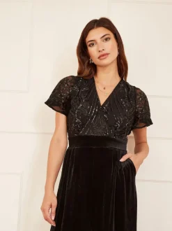 Jumpsuits En Playsuits*Yumi - jumpsuit met engelmouwen, van fluweel en versierd met lovertjes Zwart