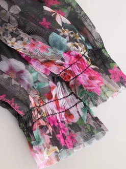Jurken|Next Zwart bloemenprint - Feestjurk van mesh met lange mouwen (3-16jr)