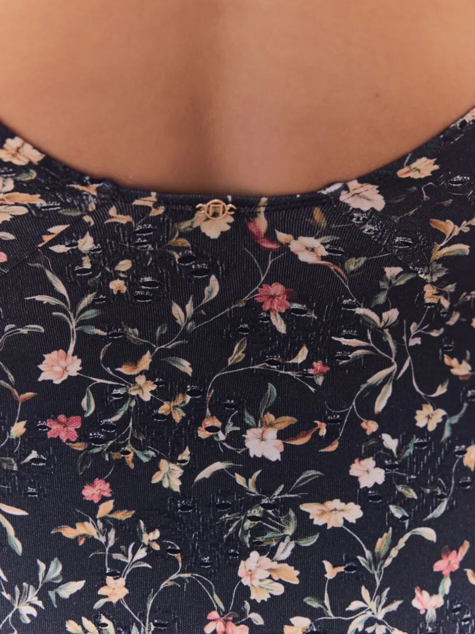 Badkleding|Next Zwart met broderie en fijne print - Badpak met vormgevende zijrimpeling en buikcorrectie