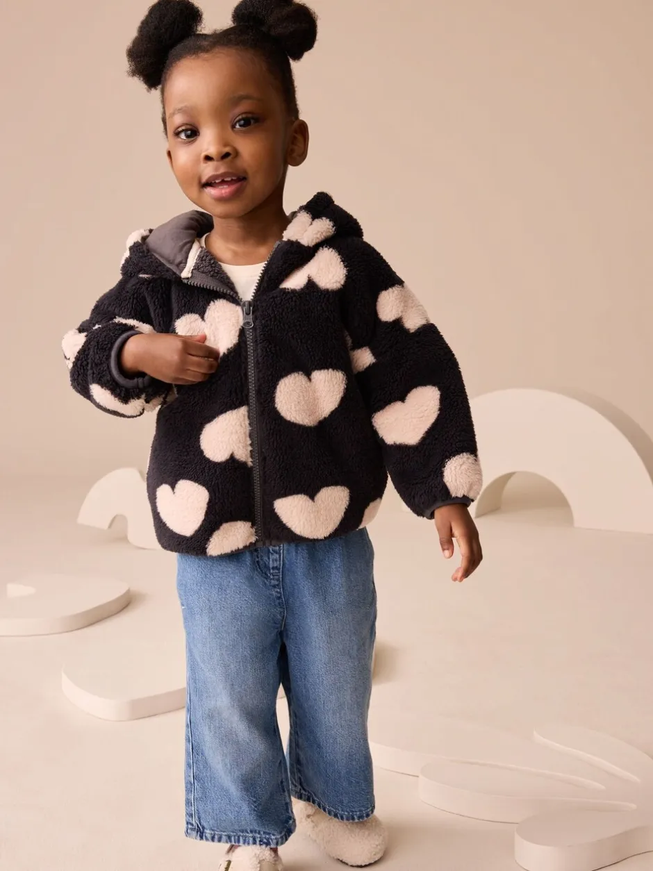 Truien En Breisels|Jassen, Jacks En Kinderwagenpakjes|Next - Fleece met ritssluiting (3mnd-7jr) Zwart met hartjesprint