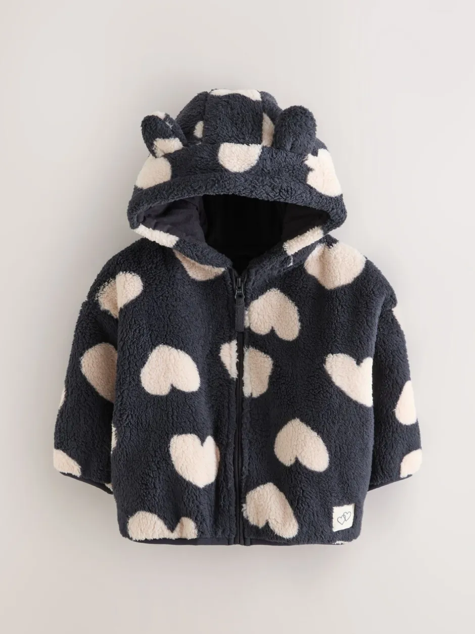 Truien En Breisels|Jassen, Jacks En Kinderwagenpakjes|Next - Fleece met ritssluiting (3mnd-7jr) Zwart met hartjesprint