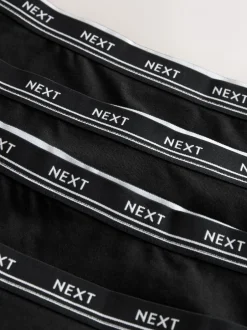Onderbroeken|Next Zwart met zwart logo - 4 Katoenen slipjes met logotailleband