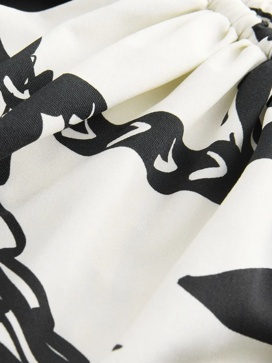 Badkleding*Next Zwart/Crème Palm - Badpak met vormgevende zijrimpeling en buikcorrectie