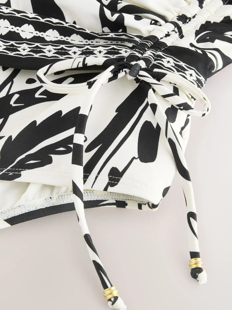 Badkleding*Next Zwart/Crème Palm - Badpak met vormgevende zijrimpeling en buikcorrectie