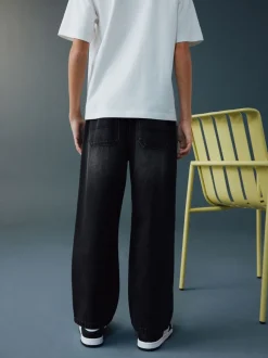 Jeans*Next - Denim jeans met elastische taille (3-16jr) Zwarte wassing