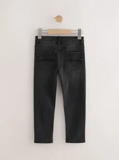 Jeans*Next Zwarte wassing - Stretchjeans (3-17jr)