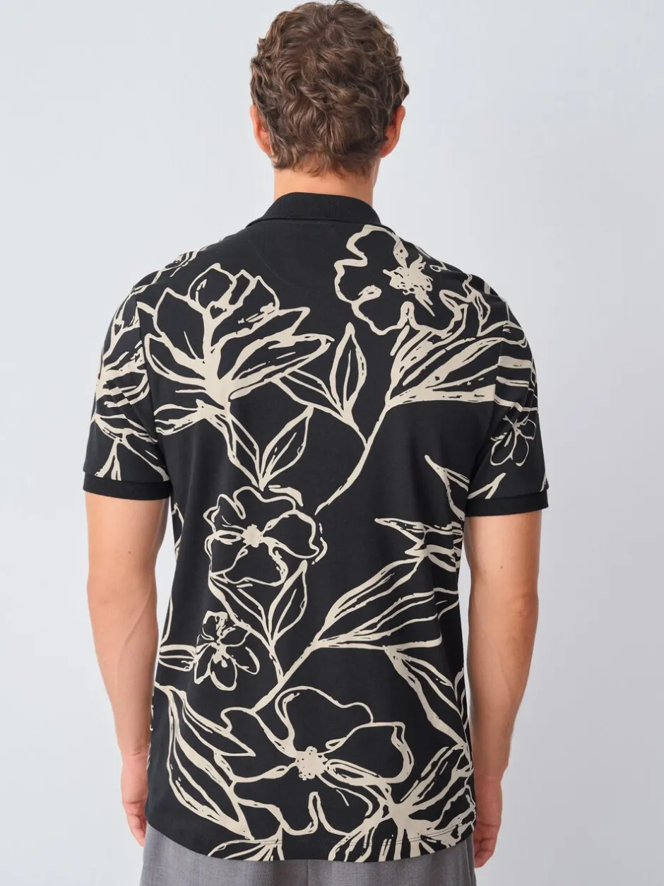 Poloshirts|Next Zwartgoud met bloemenprint - Poloshirt met korte mouwen en print