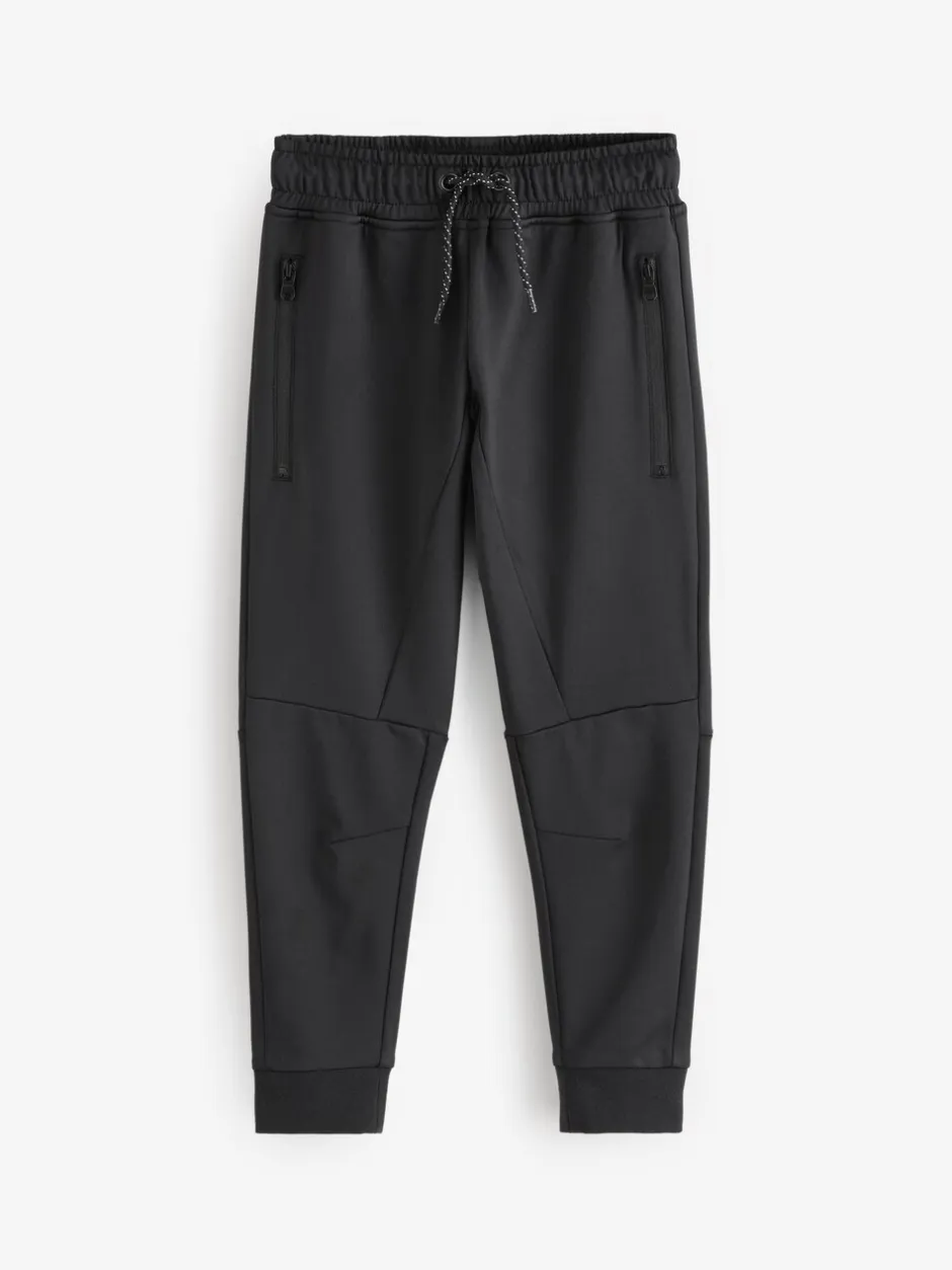 Joggingbroeken|Next - Slim-fit joggingbroek met ritszak (3-16jr) Zwart/marineblauw