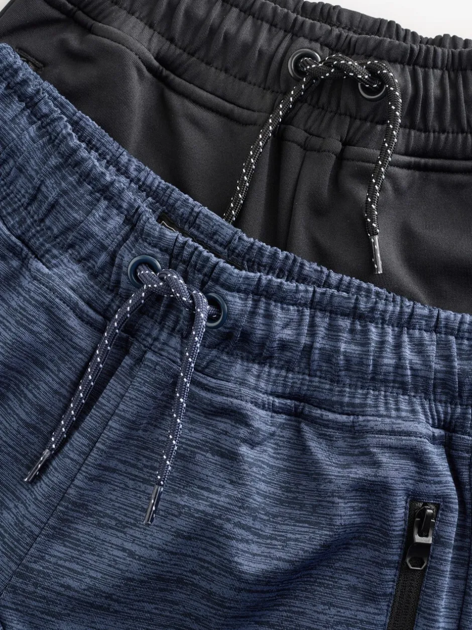 Joggingbroeken|Next - Slim-fit joggingbroek met ritszak (3-16jr) Zwart/marineblauw