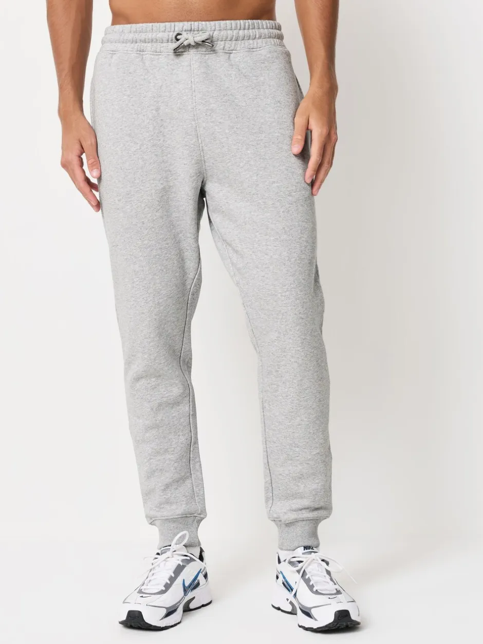 Joggingbroeken|Next - Verpakking van 3 slim-fit jersey joggingbroeken met hoog katoengehalte Zwart/marineblauw/grijs