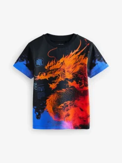 T-Shirts|Tops*Next Zwart/Oranje draak - T-shirt met normale pasvorm, korte mouwen en all-over print (3-16jr)