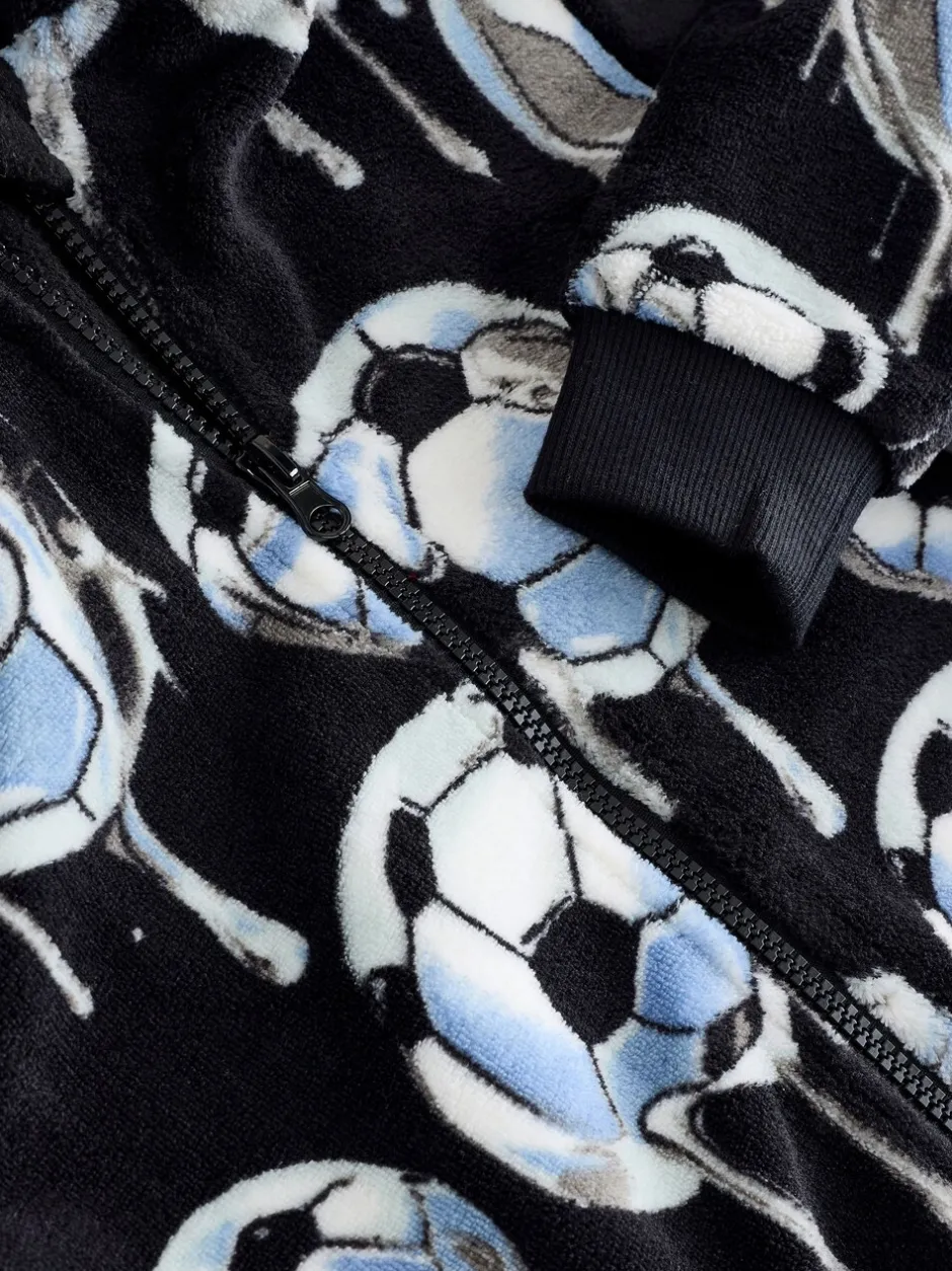 Nachtkleding En Pyjama's|Pyjama's|Next - All-in-ones fleece pyjama (3-16jr) Zwart/wit met voetbal